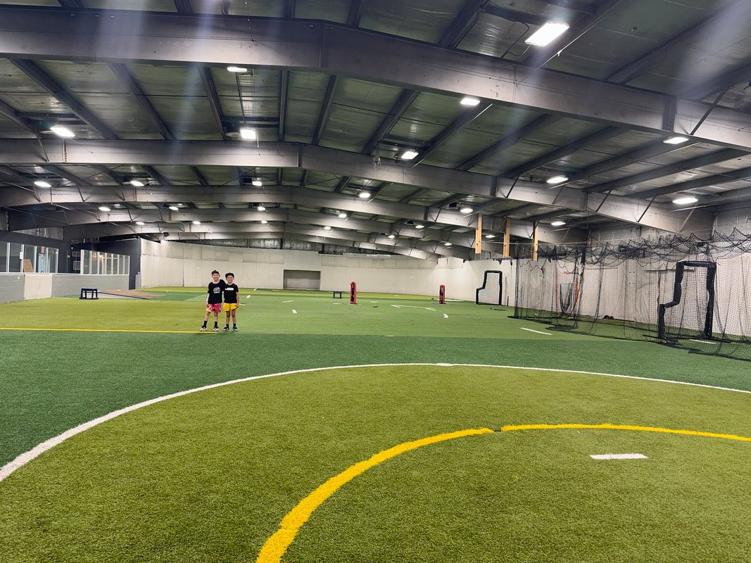 The turf field and batting cages inside Overtime Training Academy